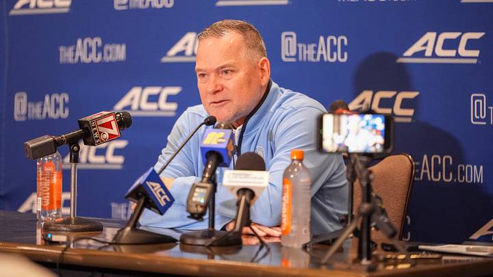 Oct 7, 2026; Charlotte, NC, USA; UNC Tar Heels head coach Michael Malone answers questions from the media during the ACC Tip-Off in Charlotte, NC. Mandatory Credit: Jim Dedmon-Imagn Images Oct 7, 2026; Charlotte, NC, USA; UNC Tar Heels head coach Michael Malone answers questions from the media during the ACC Tip-Off in Charlotte, NC. Mandatory Credit: Jim Dedmon-Imagn Images