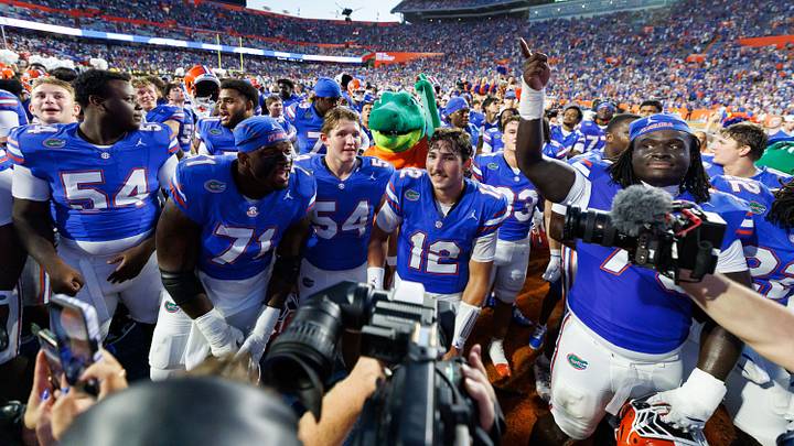 Sep 26, 2026; Gainesville, Florida, USA;  Florida Gators offensive lineman Roderick Kearney (71), Florida Gators offensive lineman Javarii Luckas (54) and Florida Gators quarterback Aaron Philo (12) celebrate with teammates after a game against the Mississippi Rebels at Ben Hill Griffin Stadium.  Mandatory Credit: Matt Pendleton-Imagn Images
