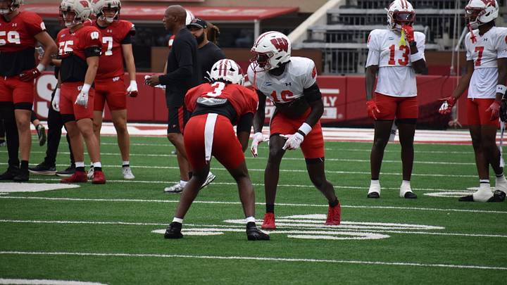 Wisconsin CB Cai Bates lines up against wideout Malachi Coleman. Wisconsin CB Cai Bates lines up against wideout Malachi Coleman.