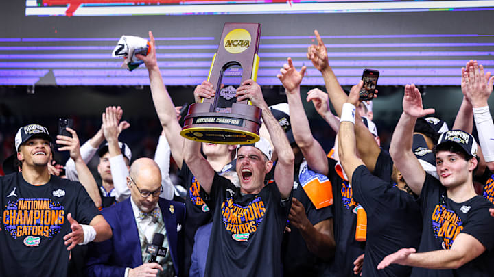 Head coach Todd Golden celebrates after leading the Florida Gators to a national championship in his third season as the head coach. Head coach Todd Golden celebrates after leading the Florida Gators to a national championship in his third season as the head coach.
