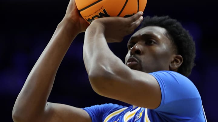 Mar 22, 2026; Philadelphia, PA, USA; UCLA Bruins center Xavier Booker (1) shoots the ball against the UConn Huskies in the second half during a second round game of the men's 2026 NCAA Tournament at Xfinity Mobile Arena. Mandatory Credit: Bill Streicher-Imagn Images