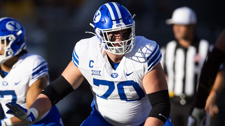 Nov 23, 2024; Tempe, Arizona, USA; Brigham Young Cougars offensive lineman Connor Pay (70) against the Arizona State Sun Devils at Mountain America Stadium. Mandatory Credit: Mark J. Rebilas-Imagn Images