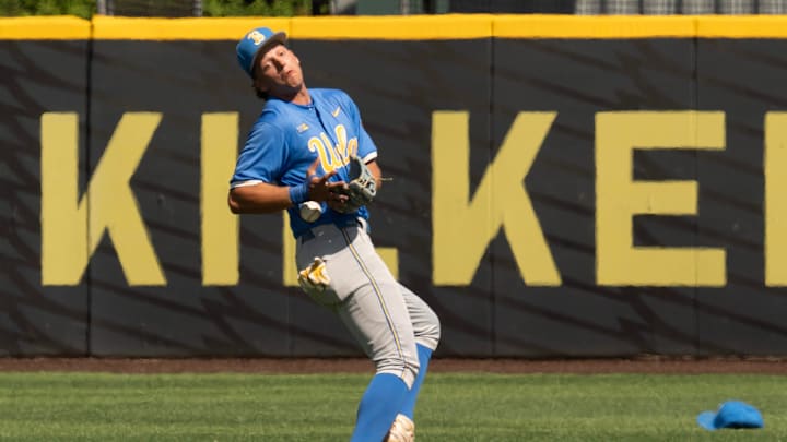 UCLA infielder Roch Cholowsky bobbles a hit by Oregon’s Cole Fisher during the third inning at PK Park in Eugene.