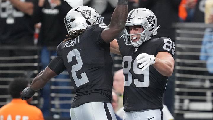 Dec 7, 2025; Paradise, Nevada, USA;  Las Vegas Raiders tight end Brock Bowers (89) reacts with running back Ashton Jeanty (2) after catching a touchdown against the Denver Broncos during the first half at Allegiant Stadium. Mandatory Credit: Kirby Lee-Imagn Images