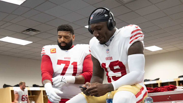 San Francisco 49ers left tackle Trent Williams (L) and wide receiver Deebo Samuel (R)