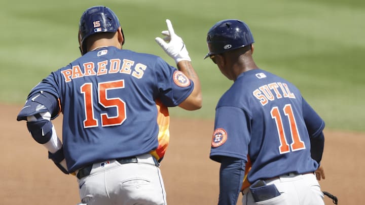 Isaac Paredes rounds first base. 