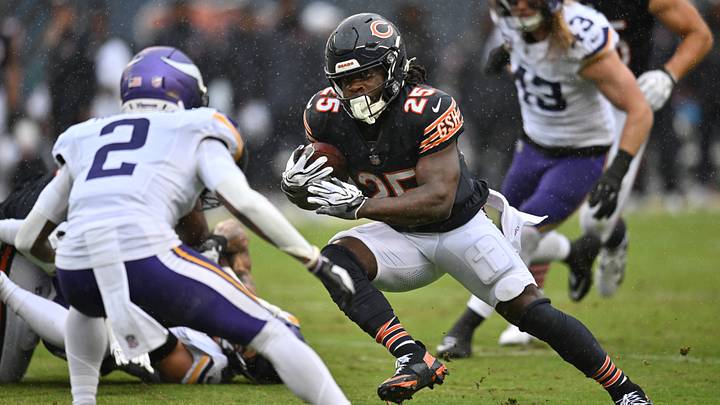 Chicago Bears running back Kyle Monangai (25) runs the ball against Minnesota Vikings cornerback Isaiah Rodgers (2) during the first quarter at Soldier Field. Mandatory Credit: Patrick Gorski-Imagn Images Chicago Bears running back Kyle Monangai (25) runs the ball against Minnesota Vikings cornerback Isaiah Rodgers (2) during the first quarter at Soldier Field. Mandatory Credit: Patrick Gorski-Imagn Images