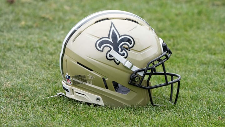 Aug 14, 2025; Carson, CA, USA; A New Orleans Saints helmet on the field during a joint practice against the Los Angeles Rams at the Dignity Health Sports Park. Mandatory Credit: Kirby Lee-Imagn Images Aug 14, 2025; Carson, CA, USA; A New Orleans Saints helmet on the field during a joint practice against the Los Angeles Rams at the Dignity Health Sports Park. Mandatory Credit: Kirby Lee-Imagn Images