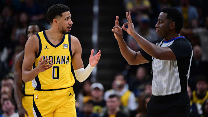Oct 27, 2024; Indianapolis, Indiana, USA; Indiana Pacers guard Tyrese Haliburton (0) reacts to a call during the second half against the Philadelphia 76ers at Gainbridge Fieldhouse. Mandatory Credit: Marc Lebryk-Imagn Images