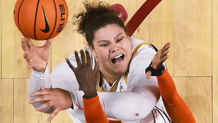 Iowa State Cyclones' center Audi Crooks (55) shoots the ball over Oklahoma State Cowgirls forward Achol Akot (11) during the second quarter in the senior day women basketball at Hilton Coliseum on February. 25, 2026, in Ames, Iowa.