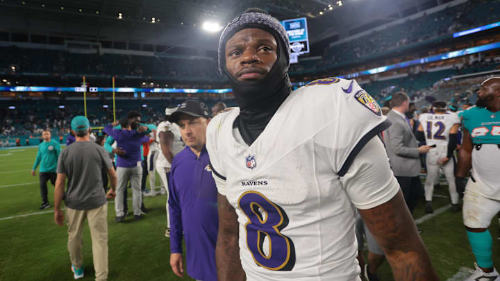 Baltimore Ravens quarterback Lamar Jackson walks off the field after a win over Miami Dolphins.