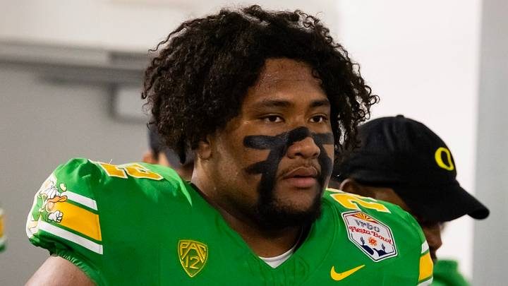 Jan 1, 2024; Glendale, AZ, USA; Oregon Ducks offensive lineman Iapani Laloulu after the 2024 Fiesta Bowl at State Farm Stadium against the Liberty Flames. Mandatory Credit: Mark J. Rebilas-USA TODAY Sports Jan 1, 2024; Glendale, AZ, USA; Oregon Ducks offensive lineman Iapani Laloulu after the 2024 Fiesta Bowl at State Farm Stadium against the Liberty Flames. Mandatory Credit: Mark J. Rebilas-USA TODAY Sports
