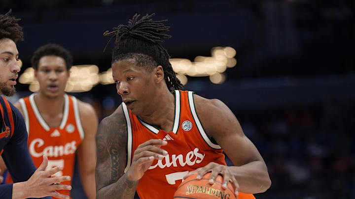 Mar 13, 2026; Charlotte, NC, USA; Miami Hurricanes forward Shelton Henderson (7) goes to the basket against the Virginia Cavaliers during the second half at Spectrum Center. Mandatory Credit: Jim Dedmon-Imagn Images Mar 13, 2026; Charlotte, NC, USA; Miami Hurricanes forward Shelton Henderson (7) goes to the basket against the Virginia Cavaliers during the second half at Spectrum Center. Mandatory Credit: Jim Dedmon-Imagn Images