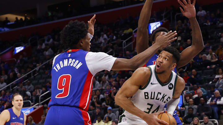 Jan 20, 2024; Detroit, Michigan, USA;  Milwaukee Bucks forward Giannis Antetokounmpo (34) is defended by Detroit Pistons forward Ausar Thompson (9) and center Jalen Duren (0) in the second half at Little Caesars Arena. Mandatory Credit: Rick Osentoski-Imagn Images