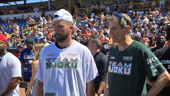 Travis Kelce talks with Bernie Kosar at Browns TE David Njoku's Celebrity Softball Game at Classic Park in Eastlake, OH