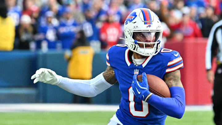 Nov 3, 2024; Orchard Park, New York, USA; Buffalo Bills wide receiver Keon Coleman (0) carries the ball after making a catch against the Miami Dolphins in the fourth quarter at Highmark Stadium. Mandatory Credit: Mark Konezny-Imagn Images