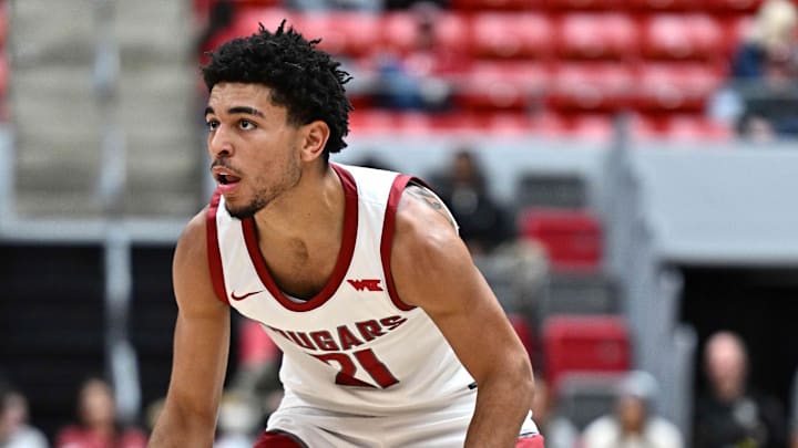 Oct 25, 2025; Pullman, WA, USA; Washington State Cougars guard Ace Glass Lll (21) controls the ball against the New Mexico Lobos in the second half at Friel Court at Beasley Coliseum. Mandatory Credit: James Snook-Imagn Images Oct 25, 2025; Pullman, WA, USA; Washington State Cougars guard Ace Glass Lll (21) controls the ball against the New Mexico Lobos in the second half at Friel Court at Beasley Coliseum. Mandatory Credit: James Snook-Imagn Images