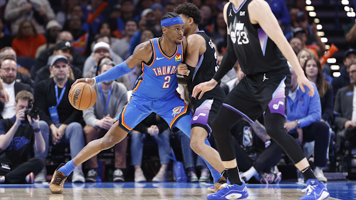 Jan 22, 2025; Oklahoma City, Oklahoma, USA; Oklahoma City Thunder guard Shai Gilgeous-Alexander (2) drives to the basket against the Utah Jazz during the second half at Paycom Center. Mandatory Credit: Alonzo Adams-Imagn Images