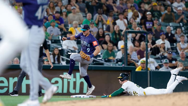 Jul 28, 2025; West Sacramento, California, USA; Seattle Mariners third baseman Ben Williamson (9) steps on third base for an out during the eighth inning against the Athletics at Sutter Health Park. Mandatory Credit: Sergio Estrada-Imagn Images