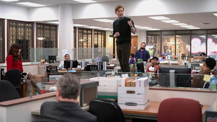 THE PAPER -- "Pilot" Episode -- Pictured: (l-r) Sabrina Impacciatore as Esmeralda, Oscar Nunez as Oscar, Domhnall Gleeson as Ned, Gbemisola Ikumelo as Adelola