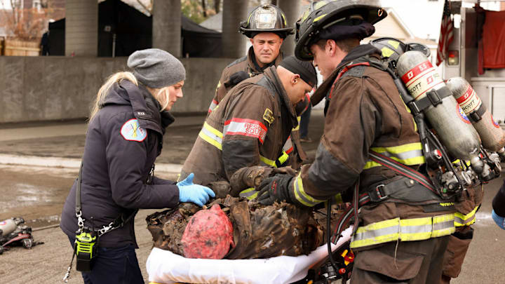 CHICAGO FIRE -- "Barely Gone" Episode 12001 -- Pictured: (l-r) Kara Killmer as Sylvie Brett, Taylor Kinney as Kelly Severide -- (Photo by: Adrian S Burrows Sr/NBC)