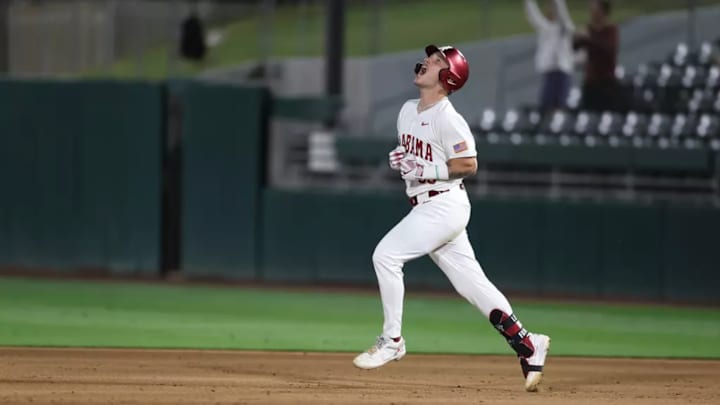 Alabama Baseball Player John Lemm (33) celebrates a walk off home run against Vanderbilt at Sewell-Thomas Stadium in Tuscaloosa, AL on Thursday, Apr 30, 2026.