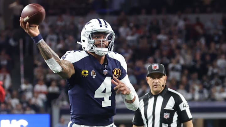 Nov 27, 2025; Arlington, Texas, USA; Dallas Cowboys quarterback Dak Prescott (4) throws a pass for a successful two-point conversion against the Kansas City Chiefs during the fourth quarter at AT&T Stadium. 