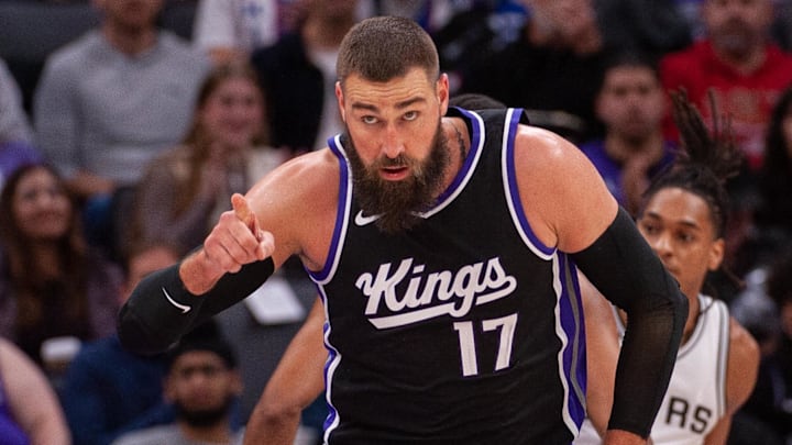 Mar 7, 2025; Sacramento, California, USA; Sacramento Kings center Jonas Valanciunas (17) points to a team mate after scoring against the San Antonio Spurs during the third quarter at Golden 1 Center. Mandatory Credit: Ed Szczepanski-Imagn Images