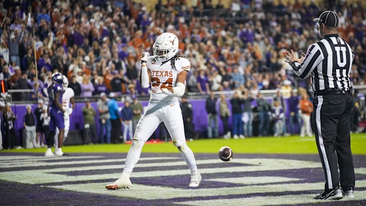 Texas Longhorns running back Jonathon Brooks (24) celebrates after he runs into the end zone for a touchdown against the TCU Horned Frogs.