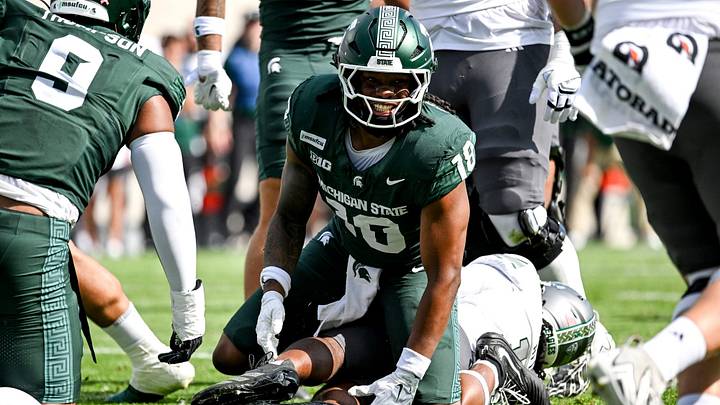 Michigan State’s Dion Crawford celebrates after a tackle against Eastern Michigan during the first quarter on Saturday, Sept. 12, 2026, at Spartan Stadium in East Lansing.