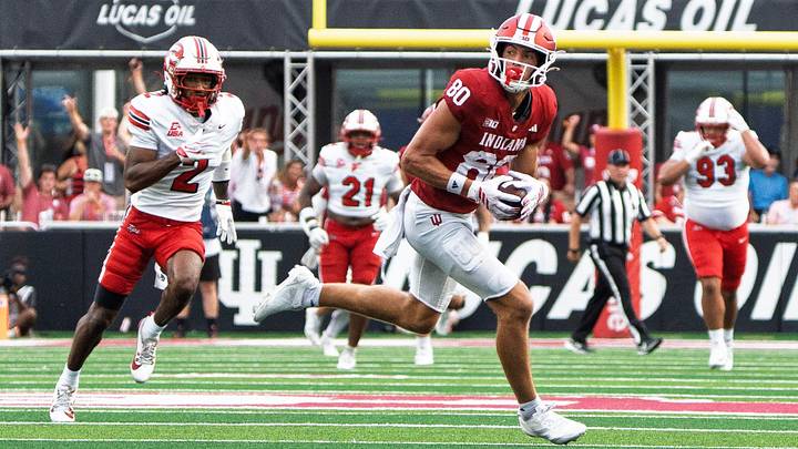 Indiana's Charlie Becker (80) runs for a touchdown during the Indiana versus Western Kentucky football game at Memorial Stadium on Saturday, Sept. 19, 2026. Indiana's Charlie Becker (80) runs for a touchdown during the Indiana versus Western Kentucky football game at Memorial Stadium on Saturday, Sept. 19, 2026.
