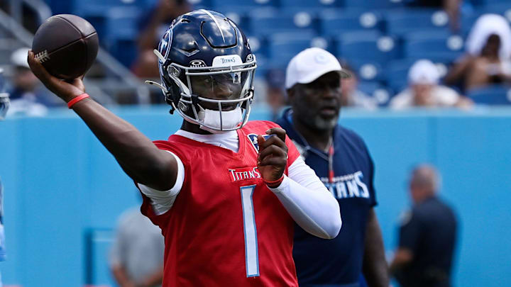 Tennessee Titans quarterback Cam Ward (1) passes during “Back Together Weekend” training camp practice at Nissan Stadium Saturday, July 26, 2025, in Nashville, Tenn.