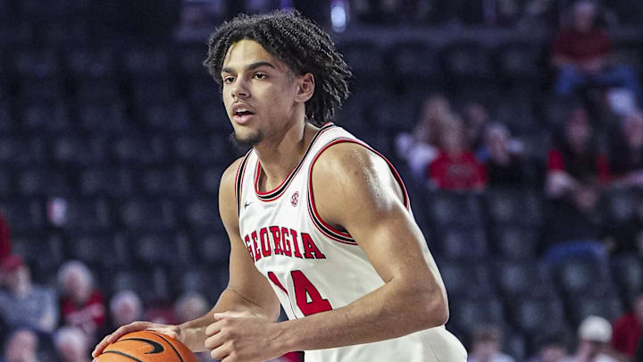 Feb 5, 2025; Athens, Georgia, USA; Georgia Bulldogs forward Asa Newell (14) handles the ball against the LSU Tigers during the second half at Stegeman Coliseum. Feb 5, 2025; Athens, Georgia, USA; Georgia Bulldogs forward Asa Newell (14) handles the ball against the LSU Tigers during the second half at Stegeman Coliseum.