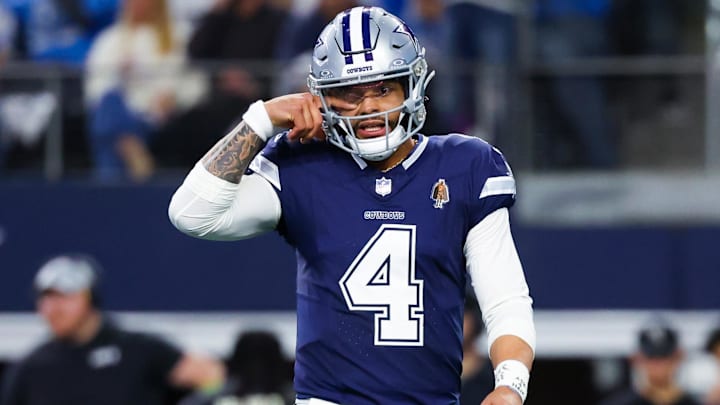 Dec 30, 2023; Arlington, Texas, USA;  Dallas Cowboys quarterback Dak Prescott (4) reacts during the game against the Detroit Lions at AT&T Stadium.