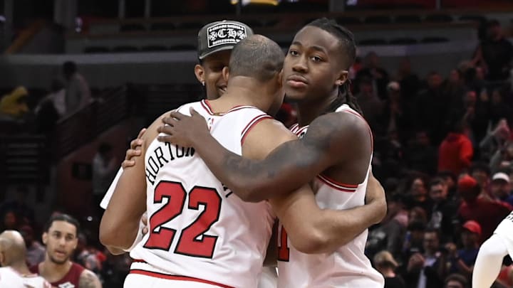 Chicago Bulls player Talen Horton-Tucker (22), guard Ayo Dosunmu (11) and forward Dalen Terry (25) hug after then game against the Cleveland Cavaliers at the United Center. Mandatory Credit: Matt Marton-Imagn Images