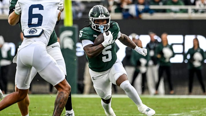 Michigan State's Makhi Frazier runs for a gain against Penn State during the first quarter on Saturday, Nov. 15, 2025, at Spartan Stadium in East Lansing. Michigan State's Makhi Frazier runs for a gain against Penn State during the first quarter on Saturday, Nov. 15, 2025, at Spartan Stadium in East Lansing.