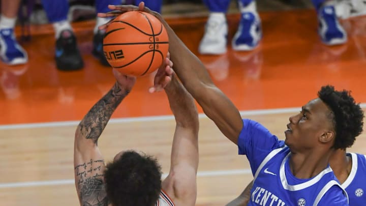 Dec 3, 2024; Clemson, South Carolina, USA; Clemson guard Jaeden Zachery (11) has a shot blocked by Kentucky guard Jaxson Robinson (2) during the first half  at Littlejohn Coliseum. Mandatory Credit: Ken Ruinard-Imagn Images