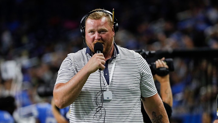 Former Lions player T.J. Lang works as sideline reporter  during the second half of the preseason game at Ford Field 