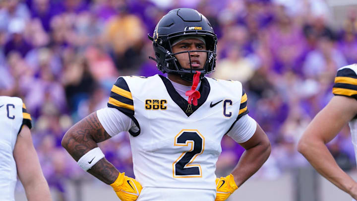 Sep 14, 2024; Greenville, North Carolina, USA; Appalachian State Mountaineers wide receiver Kaedin Robinson (2) looks on against the East Carolina Pirates during the first half at Dowdy-Ficklen Stadium. Mandatory Credit: James Guillory-Imagn Images Sep 14, 2024; Greenville, North Carolina, USA; Appalachian State Mountaineers wide receiver Kaedin Robinson (2) looks on against the East Carolina Pirates during the first half at Dowdy-Ficklen Stadium. Mandatory Credit: James Guillory-Imagn Images