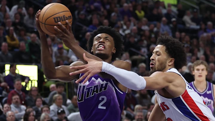 Jan 3, 2024; Salt Lake City, Utah, USA; Utah Jazz guard Collin Sexton (2) goes to the basket against Detroit Pistons guard Cade Cunningham (2) during the first quarter at Delta Center. Mandatory Credit: Rob Gray-Imagn Images
