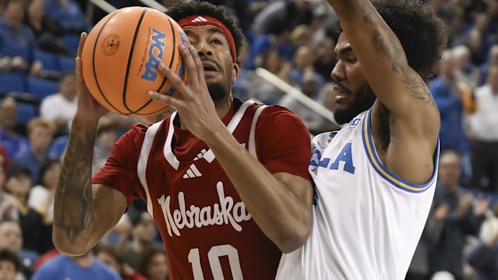 Nebraska guard Jamarques Lawrence collides with UCLA guard Donovan Dent doing the second half at Pauley Pavilion.