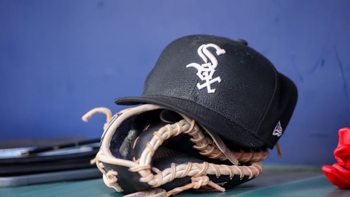 Jul 15, 2023; Atlanta, Georgia, USA; A detailed view of a Chicago White Sox hat and glove in the dugout against the Atlanta Braves in the first inning at Truist Park. Mandatory Credit: Brett Davis-Imagn Images Jul 15, 2023; Atlanta, Georgia, USA; A detailed view of a Chicago White Sox hat and glove in the dugout against the Atlanta Braves in the first inning at Truist Park. Mandatory Credit: Brett Davis-Imagn Images
