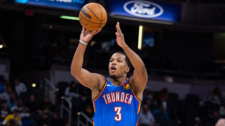 Oct 11, 2025; Indianapolis, Indiana, USA; Oklahoma City Thunder guard Chris Youngblood (3) shoots the ball in the second half against the Indiana Pacers at Gainbridge Fieldhouse. Mandatory Credit: Trevor Ruszkowski-Imagn Images