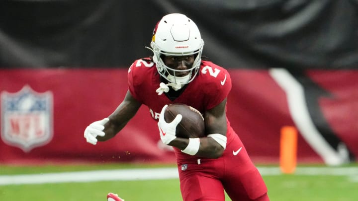 Sep 17, 2023; Glendale, AZ, USA; Arizona Cardinals wide receiver Marquise Brown (2) carries the ball past New York Giants safety Jason Pinnock (27) in the first half at State Farm Stadium. Mandatory Credit: Rob Schumacher-Arizona Republic