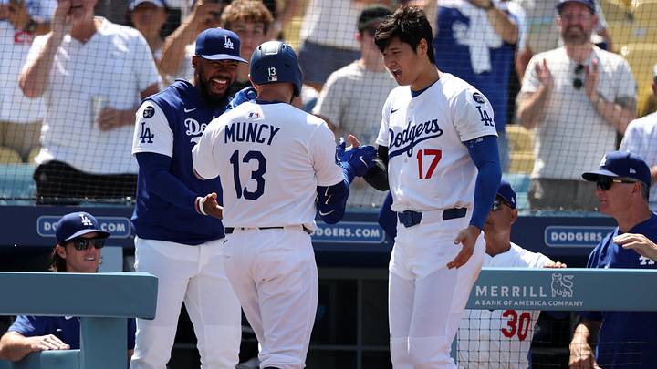 Jun 22, 2025; Los Angeles, California, USA; Los Angeles Dodgers third baseman Max Muncy (13) celebrates with right fielder Teoscar Hernandez (37, left) and two-way player Shohei Ohtani (17, right) after hitting a three-run home run during the seventh inning against the Washington Nationals at Dodger Stadium. Mandatory Credit: Kiyoshi Mio-Imagn Images Jun 22, 2025; Los Angeles, California, USA; Los Angeles Dodgers third baseman Max Muncy (13) celebrates with right fielder Teoscar Hernandez (37, left) and two-way player Shohei Ohtani (17, right) after hitting a three-run home run during the seventh inning against the Washington Nationals at Dodger Stadium. Mandatory Credit: Kiyoshi Mio-Imagn Images