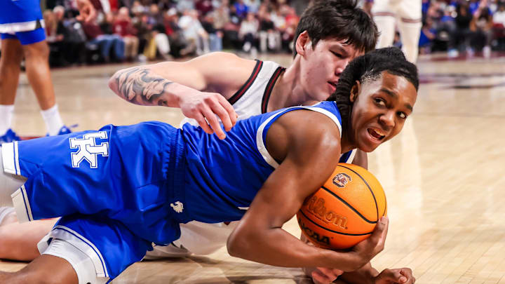 Feb 24, 2026; Columbia, South Carolina, USA; Kentucky Wildcats guard Jasper Johnson (2) steals the ball from South Carolina Gamecocks guard Mike Sharavjamts (55) during the first half at Colonial Life Arena. Mandatory Credit: Jeff Blake-Imagn Images