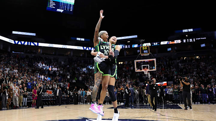 Oct 8, 2024; Minneapolis, Minnesota, USA; Minnesota Lynx guard Courtney Williams (10) and forward Napheesa Collier (24) celebrate their teams win after game five of the 2024 WNBA playoffs against the Connecticut Sun at Target Center. Mandatory Credit: Matt Krohn-Imagn Images