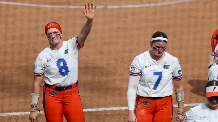 Sad Gators thank the crowd after their 16-7 loss during game 3 of the super regional of the NCAA Division 1 softball championship at Katie Seashole Pressly Stadium in Gainesville, FL on Sunday, May 24, 2026. The game ended in the 5th inning. [Alan Youngblood/Gainesville Sun]