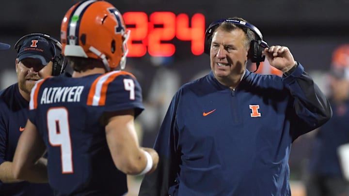 Sep 13, 2025; Champaign, Illinois, USA;  Illinois Fighting Illini head coach Bret Bielema and quarterback Luke Altmyer (9) during the second half against the Western Michigan Broncos at Memorial Stadium. Mandatory Credit: Ron Johnson-Imagn Images