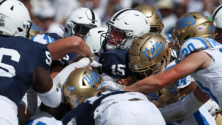 Oct 5, 2024; University Park, Pennsylvania, USA; Penn State Nittany Lions quarterback Drew Allar (15) pushes his way into the end zone for a touchdown during the second quarter against the UCLA Bruins at Beaver Stadium. Mandatory Credit: Matthew O'Haren-Imagn Images Oct 5, 2024; University Park, Pennsylvania, USA; Penn State Nittany Lions quarterback Drew Allar (15) pushes his way into the end zone for a touchdown during the second quarter against the UCLA Bruins at Beaver Stadium. Mandatory Credit: Matthew O'Haren-Imagn Images